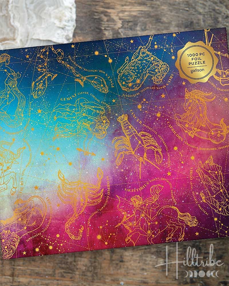Jigsaw puzzle box with zodiac designs on a gradient background