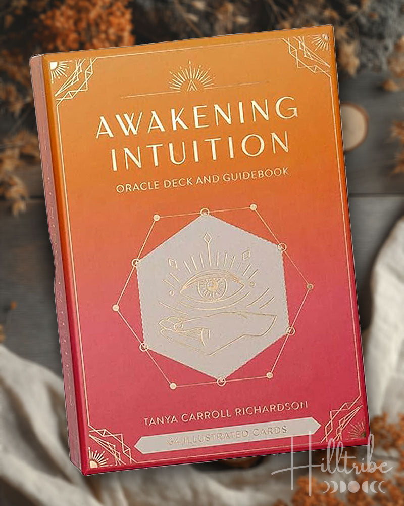 Deck titled 'Awakening Intuition' with a decorative cover on a textured surface