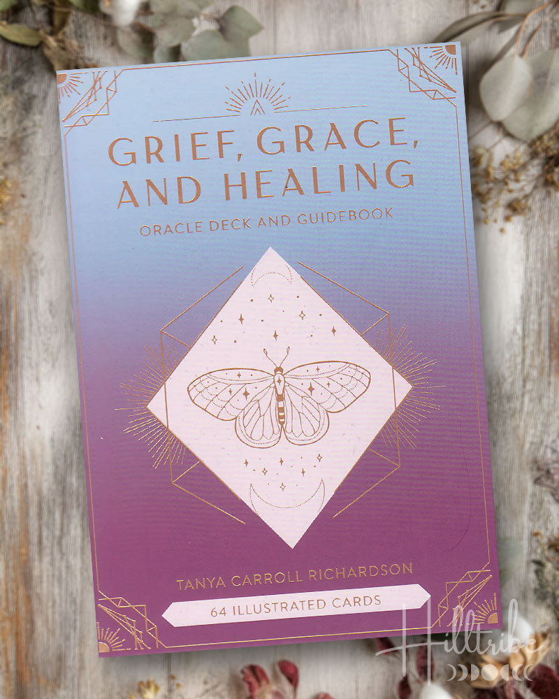 Grief, Grace, and Healing Oracle Deck and Guidebook with a butterfly illustration on a wooden surface.
