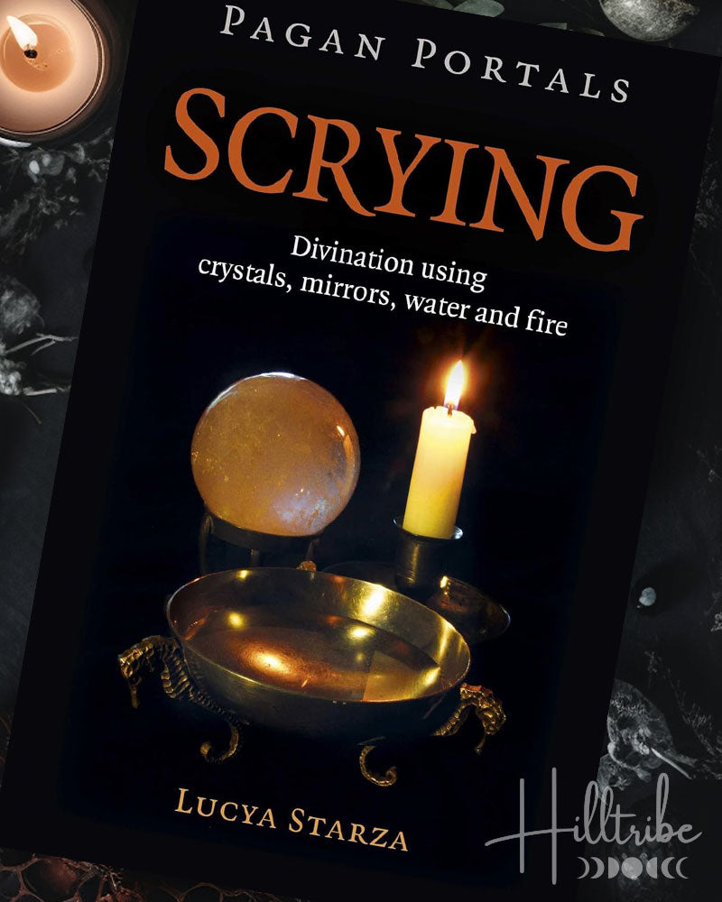 Book titled 'Pagan Portals Scrying' with a candle and crystal ball on a dark background