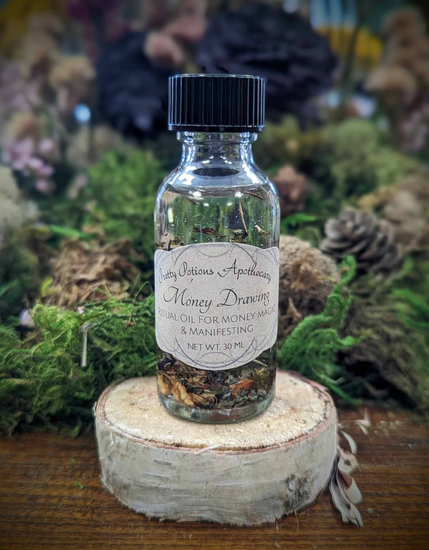 Glass bottle with a label on a wooden surface with nature-themed background