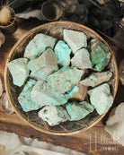 Natural Chrysocolla pieces in a dish