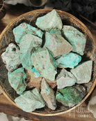 Natural Chrysocolla pieces in a dish