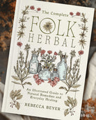 Book cover of 'The Complete Folk Herbal' with illustrations of herbs and bottles on a textured background.