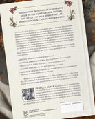 Booklet with text and illustrations about wild herbs, featuring a photo of a woman on the back.