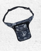 Fanny pack with cat pattern on a textured white background
