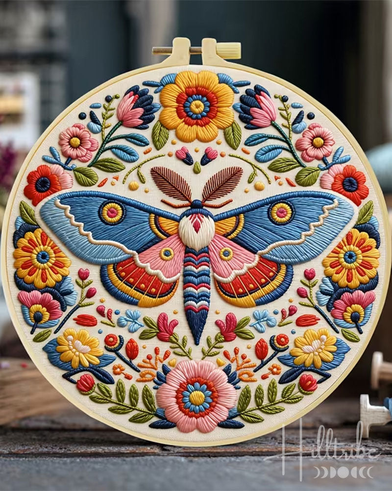 Embroidery hoop with a colorful butterfly and floral design.