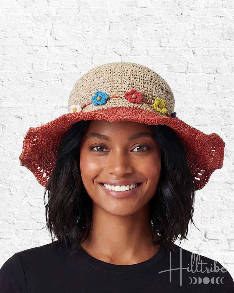 Woman wearing a colorful hemp and cotton hat with a white background