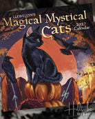 Llewellyn's Magical Mystical Cats 2027 Calendar cover featuring a black cat sitting on a pumpkin stack in front of a large orange moon, with crows, autumn leaves, and candles in the background.
