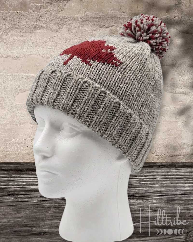 Knit toque with maple leaf design 