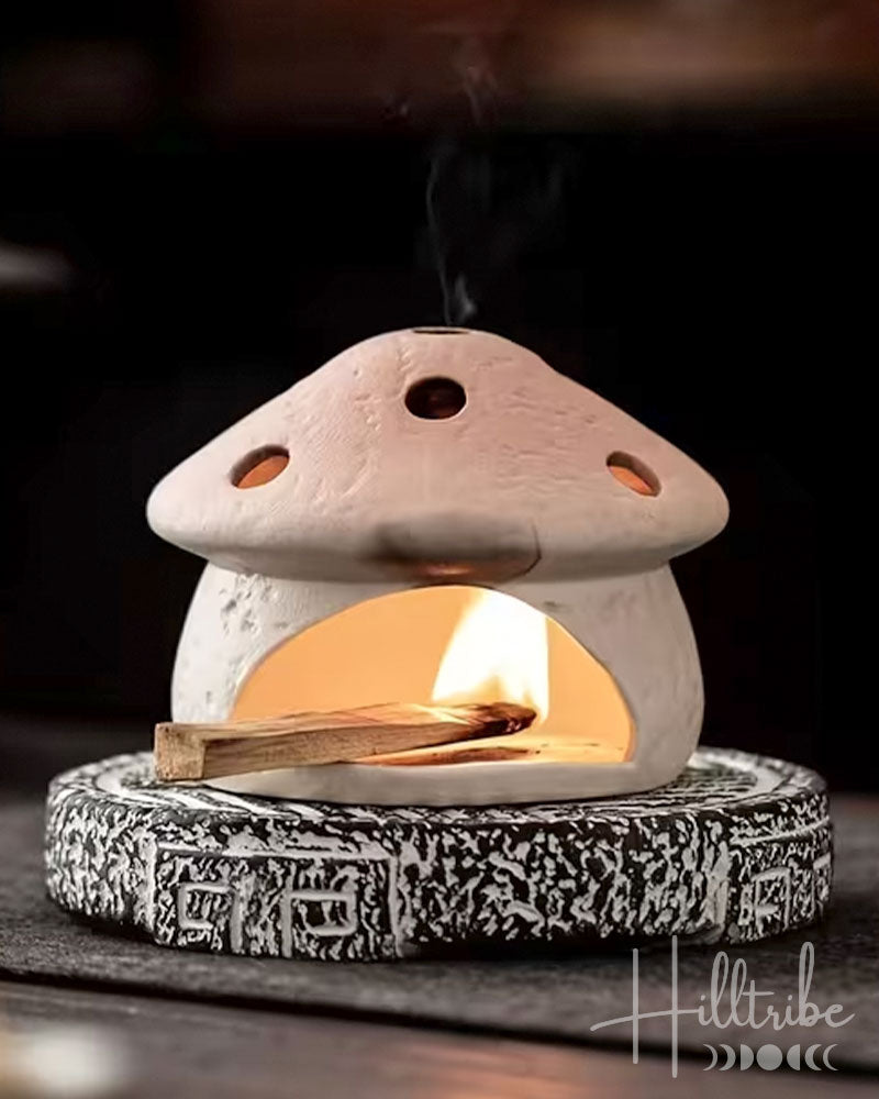Mushroom House Smudge Pot with a burning palo santo stick