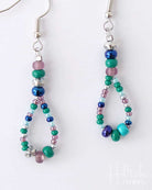 Beaded earrings with multicolor beads on a white background