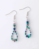 Pair of beaded earrings on a white background
