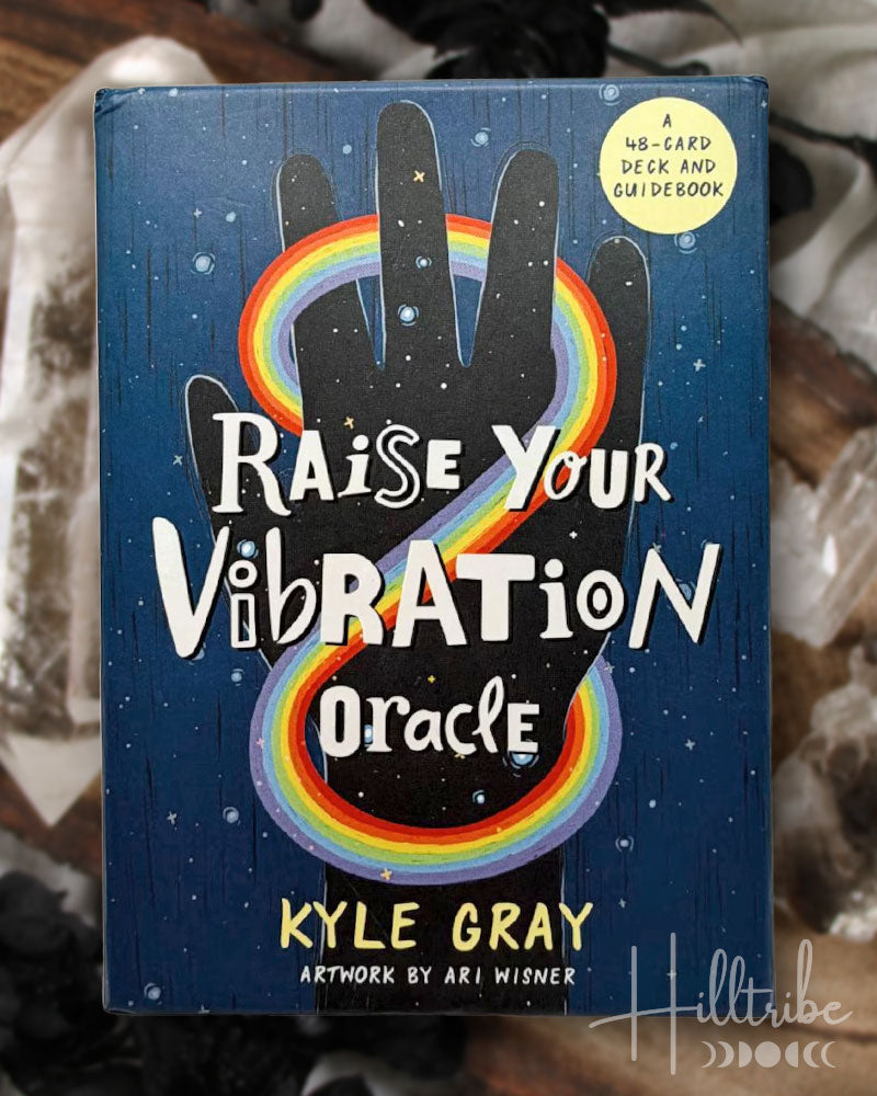 Deck titled 'Raise Your Vibration Oracle' by Kyle Gray with a rainbow design on a blue background.
