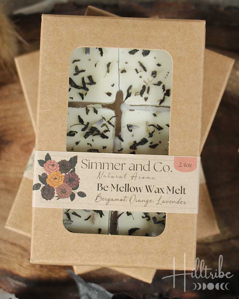Box of Simmer and Co. wax melts with a window showing the product inside.