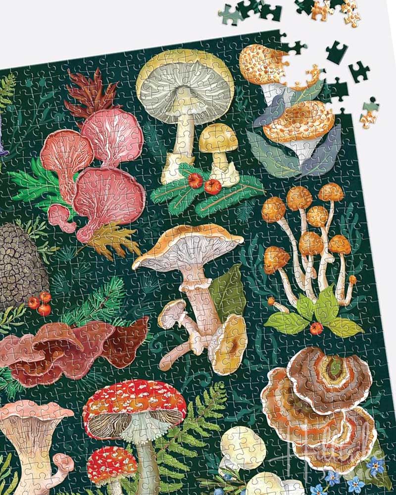 Jigsaw puzzle with colorful mushroom and leaf design on a dark green background
