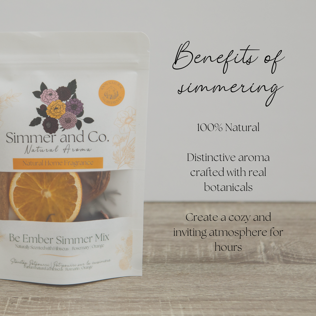 Simmer and Co. natural home fragrance packaging with text about benefits on a wooden surface.