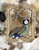 Evil Eye & Feather Protection Keychain from Hilltribe Ontario